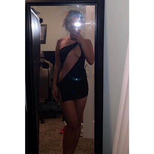 Size XS black sexy dress, brand new. Tease your boyfriend or husband with this!